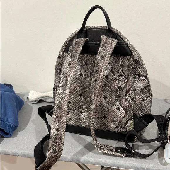 MCM Snake Print Backpack